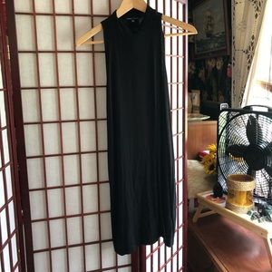 Black Kendall and Kylie sleeveless mock neck shift dress.